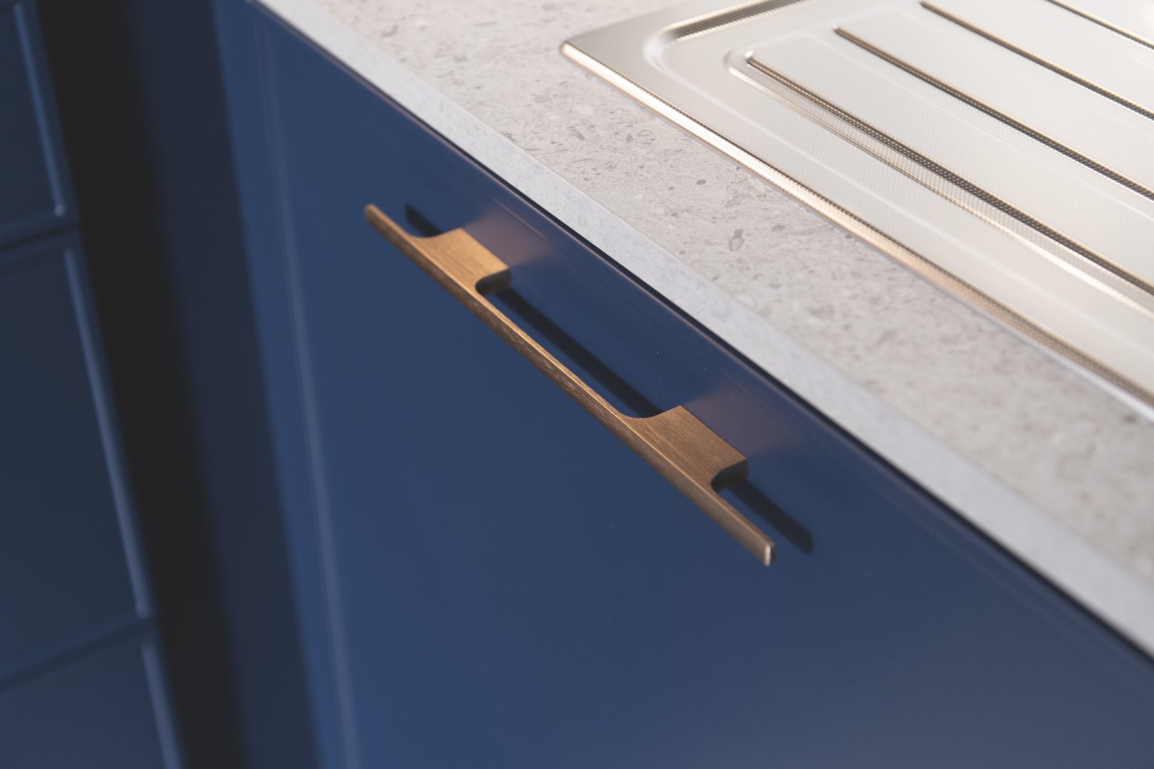 poignée dorée de meuble de cuisine